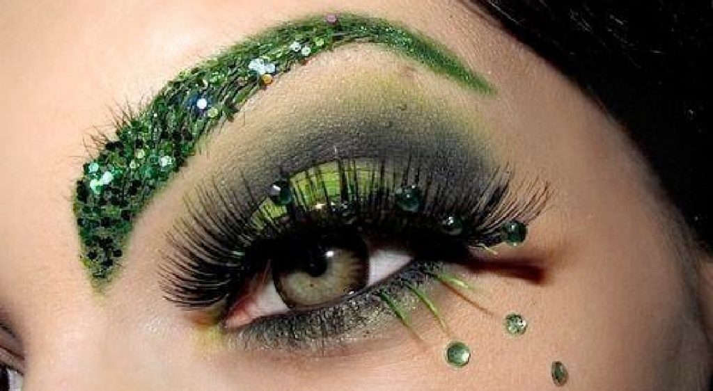 Halloween face with green glitter
